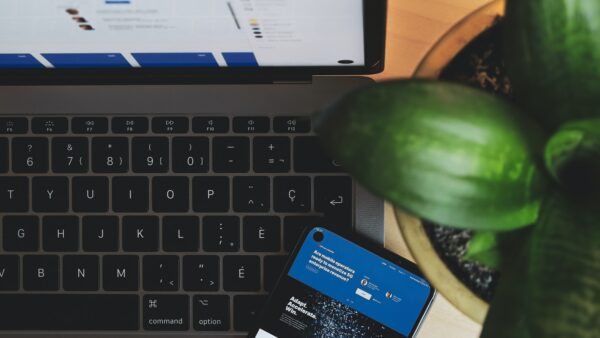 blue and white visa card on black and gray laptop computer